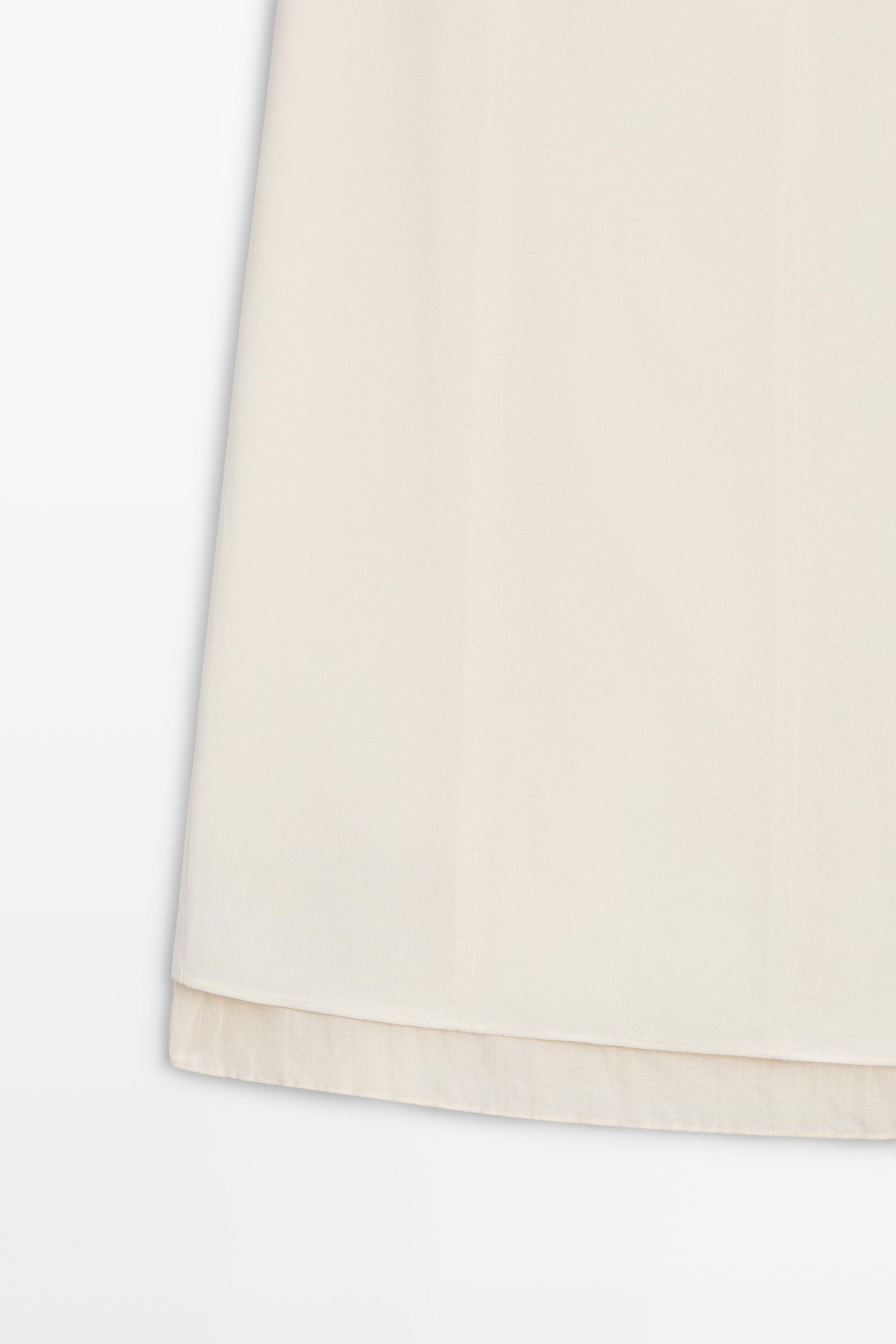 Double-layered midi skirt with seam detail